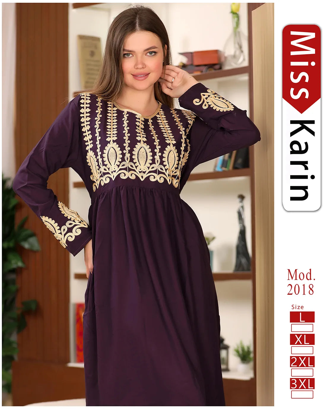 Woman wearing a purple dress with gold embroidery, sitting on a couch indoors.