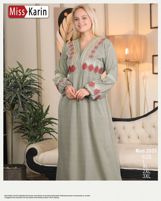 Woman wearing a green embroidered outfit sitting on a couch with 'Miss Karin' branding.