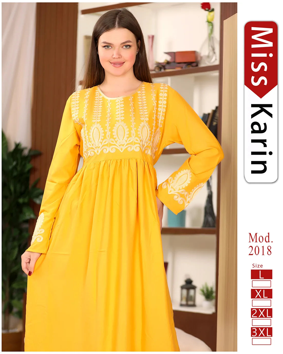 Woman wearing a yellow dress with white embroidery in a room setting, featuring 'Miss Karin' branding.