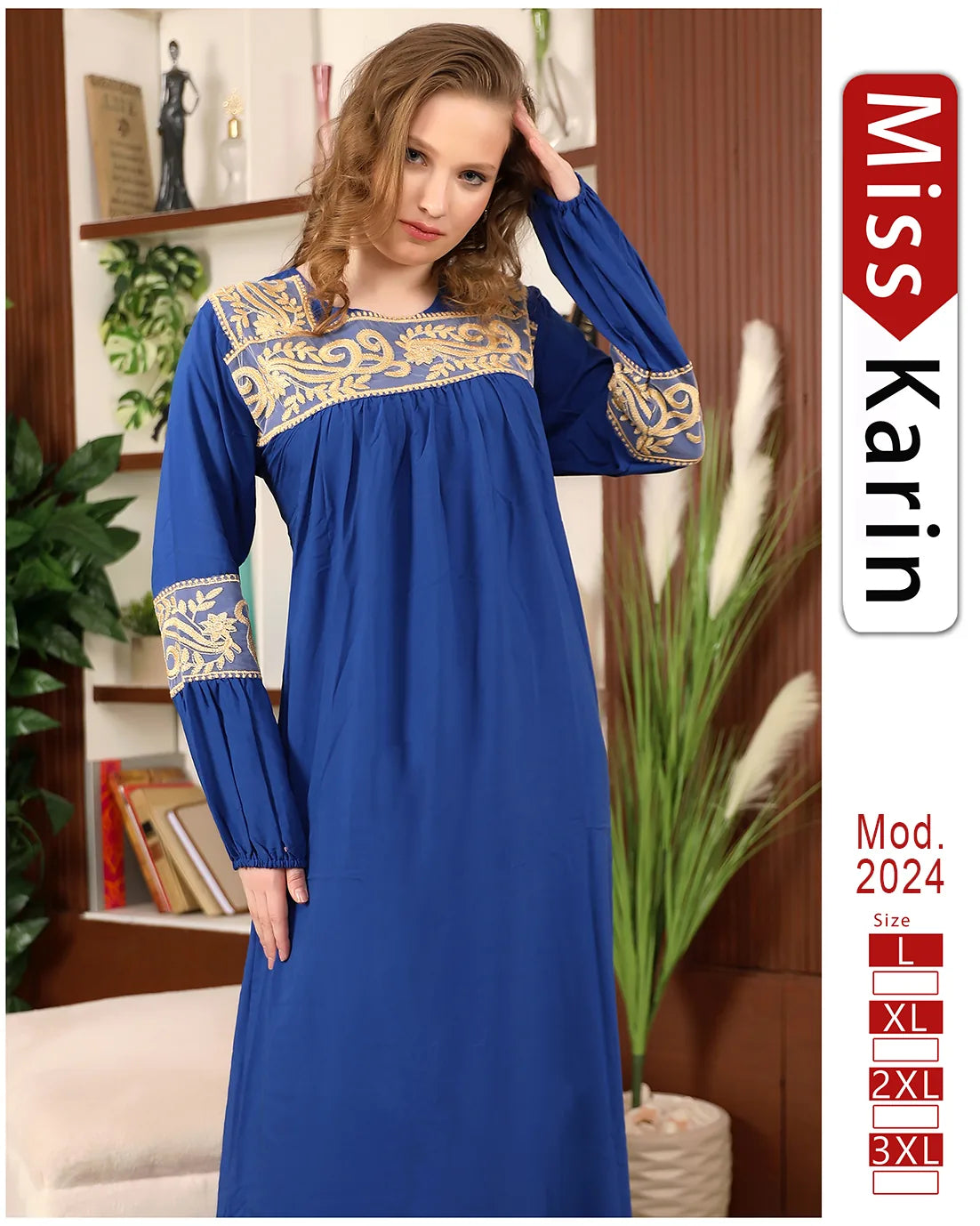 Woman wearing a blue dress with gold embroidery in a room setting, featuring 'Miss Karin' branding.