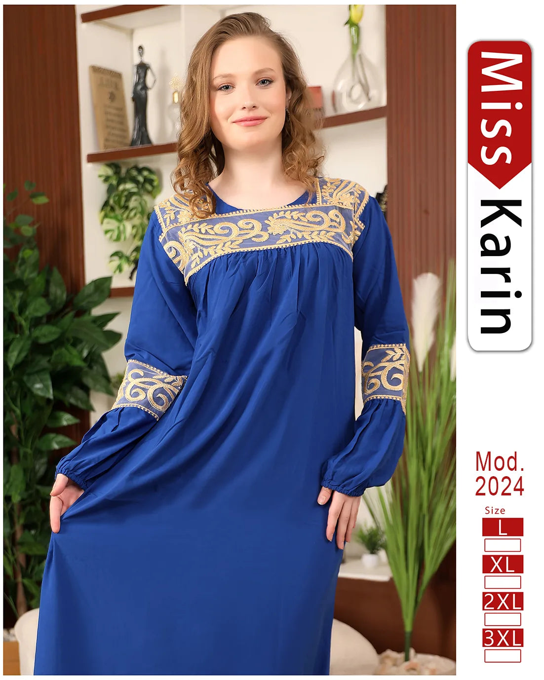 Woman wearing a blue dress with gold embroidery in an indoor setting, with 'Miss Karin' branding on the side.