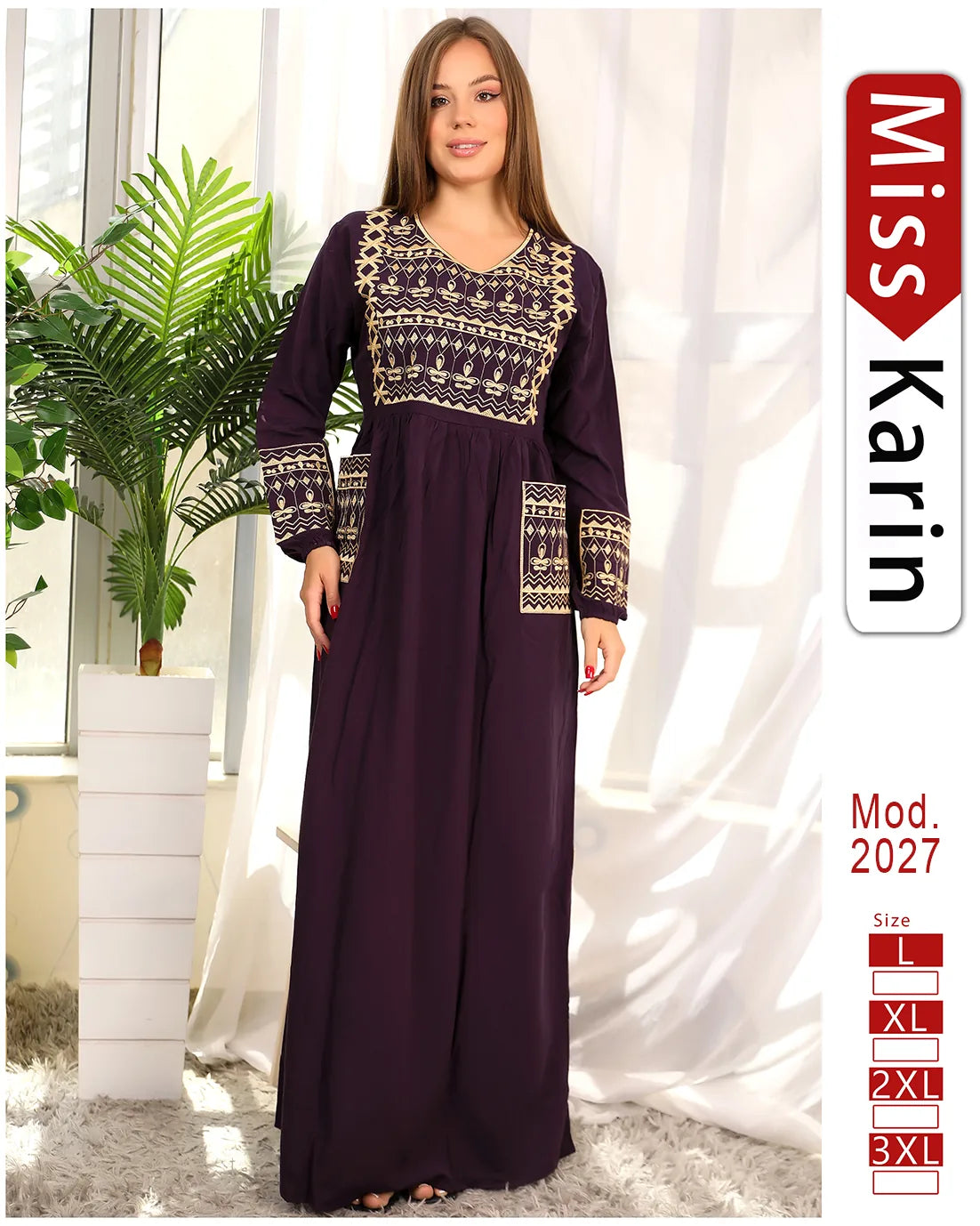 Woman wearing a long dark purple dress with gold embroidery indoors, with 'Miss Karin' branding.