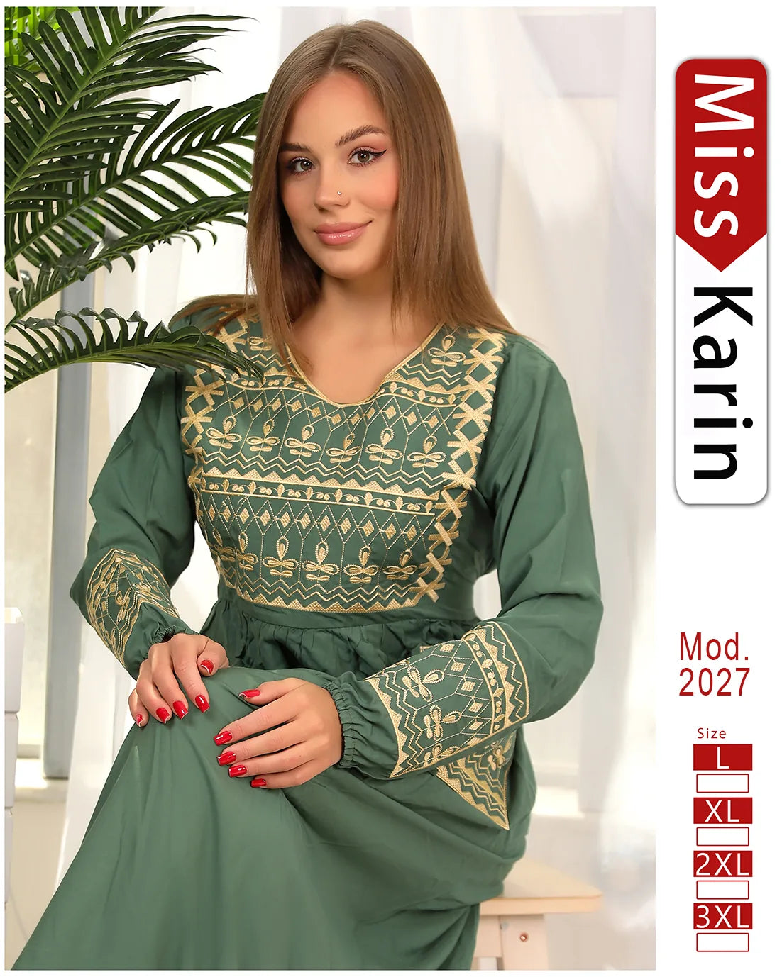 Woman wearing a green dress with gold embroidery, standing indoors with a plant in the background.