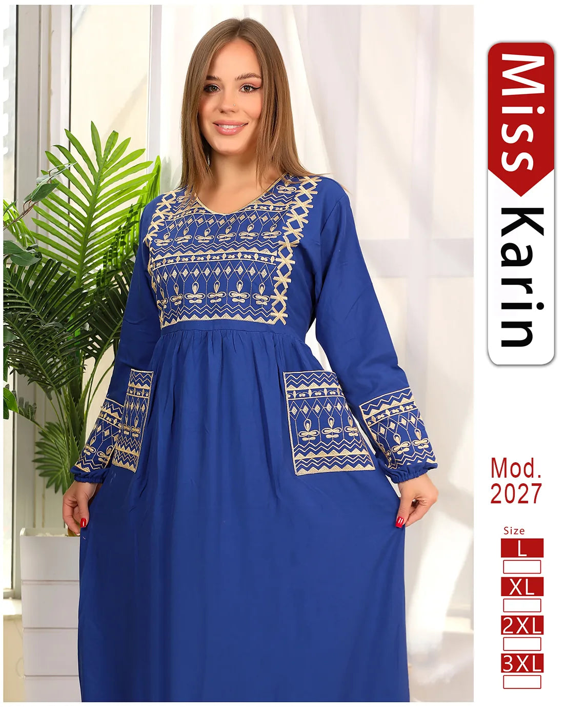 Woman wearing a blue dress with white patterns, standing indoors with a plant in the background. 'Miss Karin' brand visible.