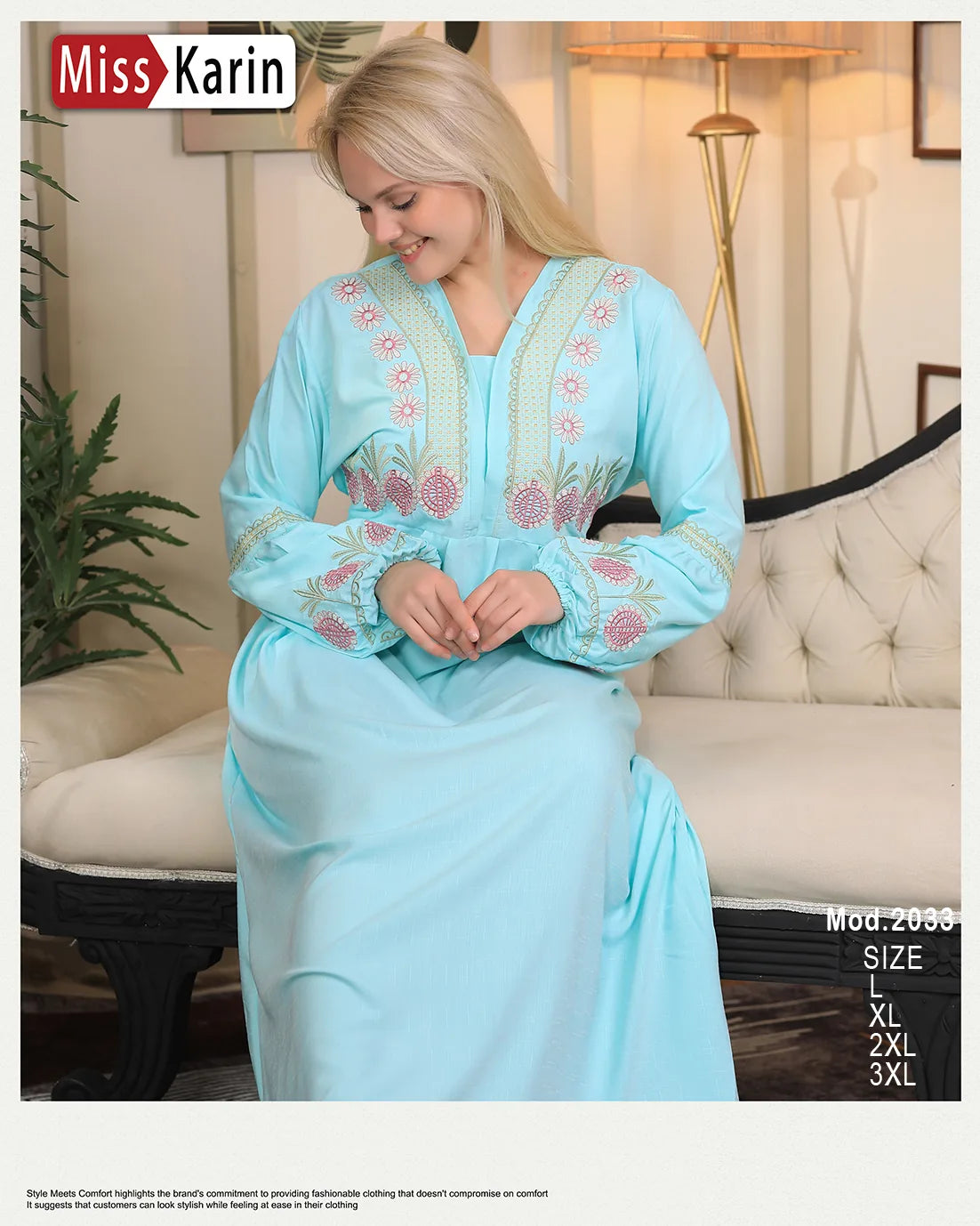 Woman wearing a light blue embroidered dress sitting on a couch with 'Miss Karin' branding.