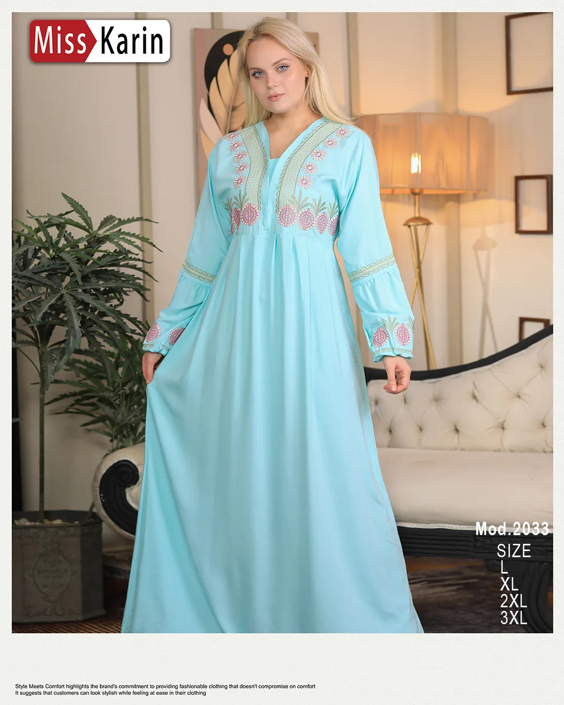 Woman wearing a light blue embroidered dress in a room setting with 'Miss Karin' branding.