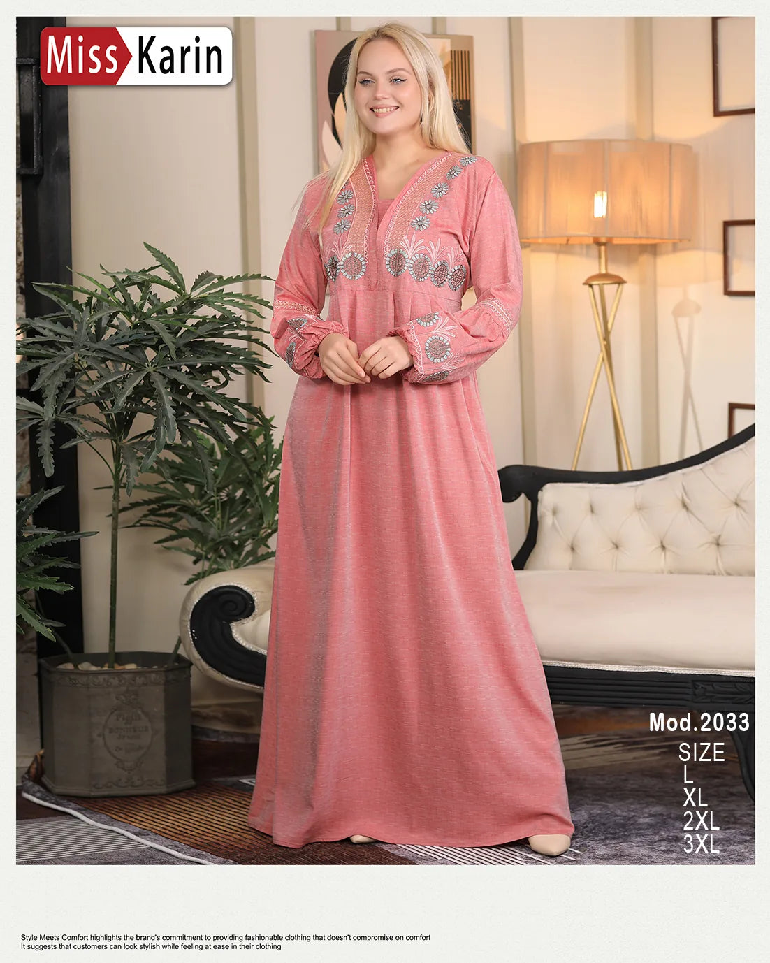 Woman wearing a pink dress with floral embroidery in a living room setting, with 'Miss Karin' branding.