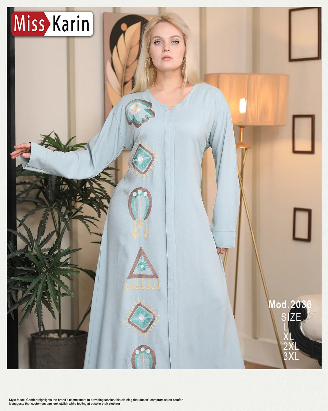 Woman wearing a light blue dress with embroidery in a home setting, featuring 'Miss Karin' branding.