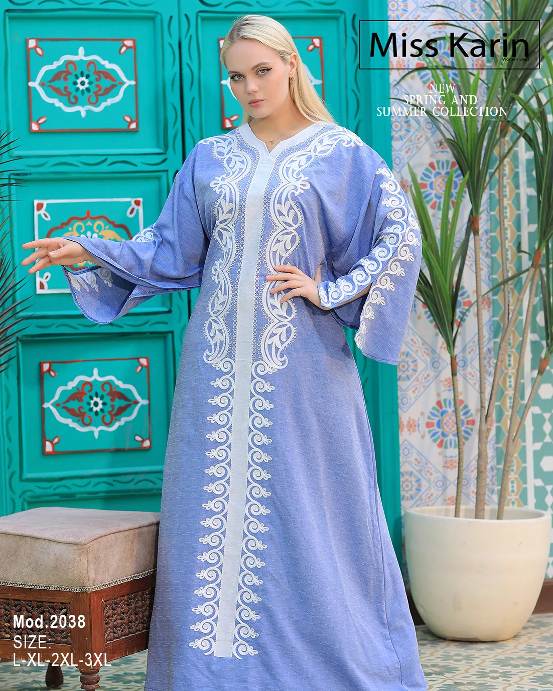 Woman wearing a light blue embroidered dress with a decorative background