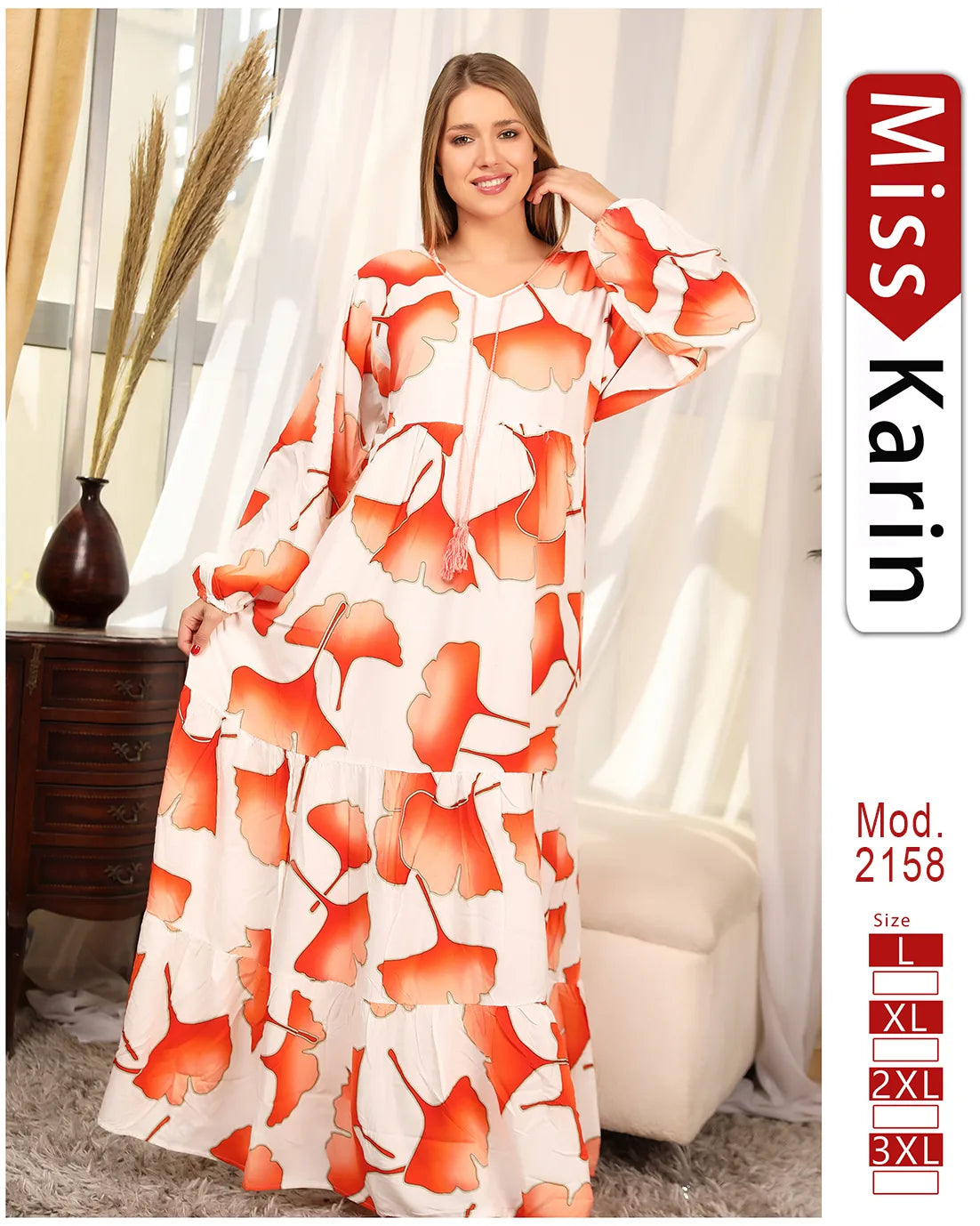 Woman wearing a floral dress with 'Miss Karin' branding in the corner.