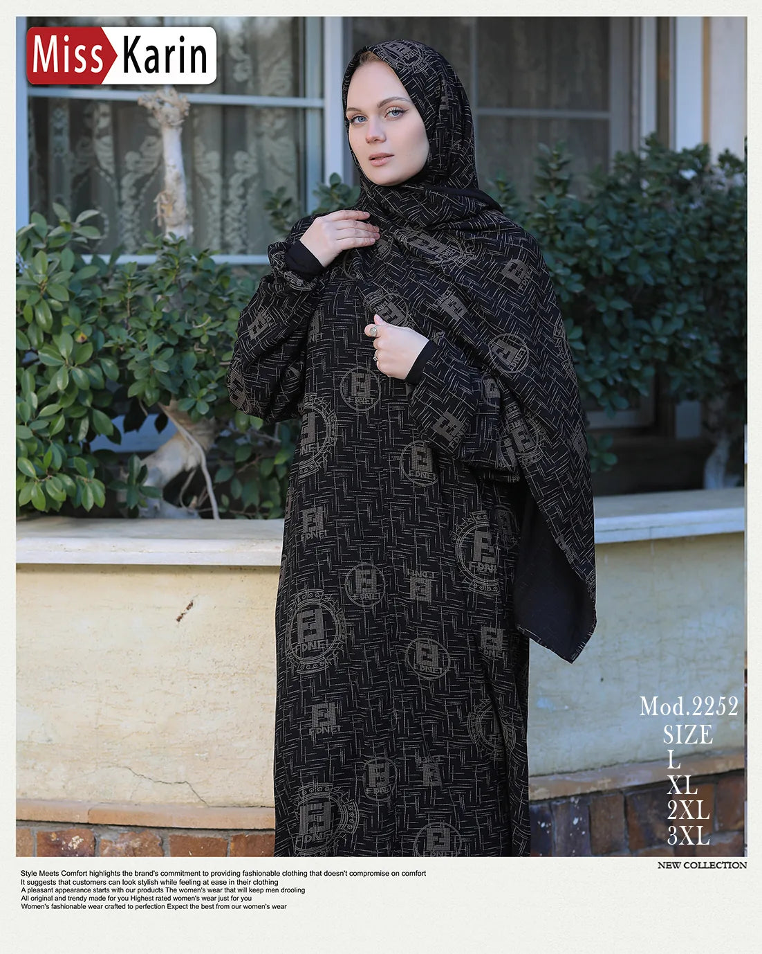 Woman wearing a black patterned hijab and dress in front of a window with plants.