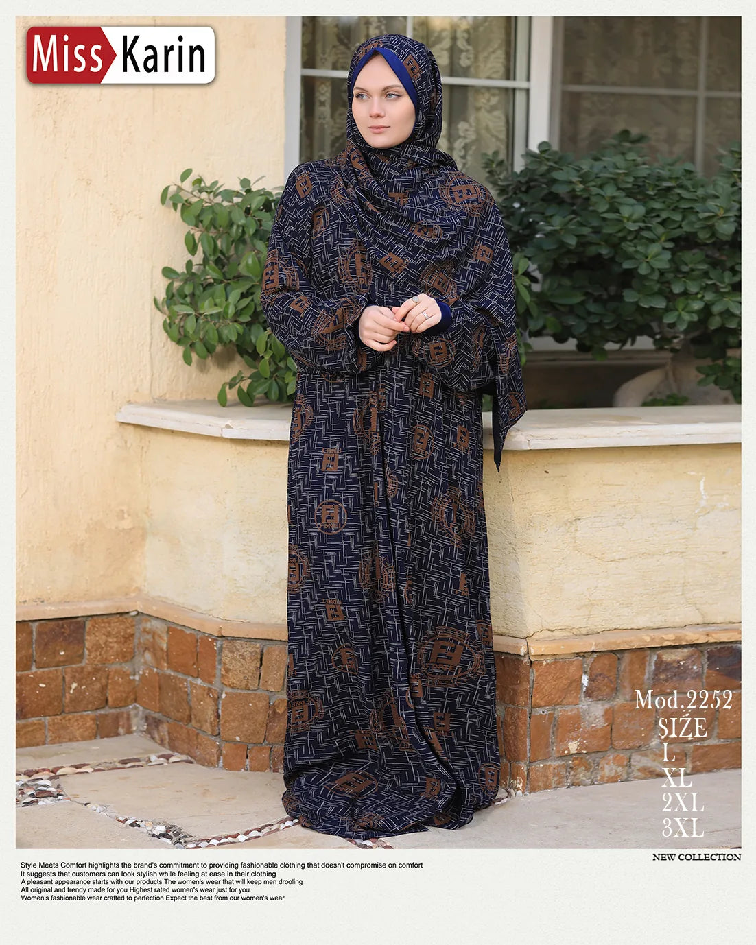 Woman wearing a long, dark patterned dress and headscarf standing outdoors with plants in the background.