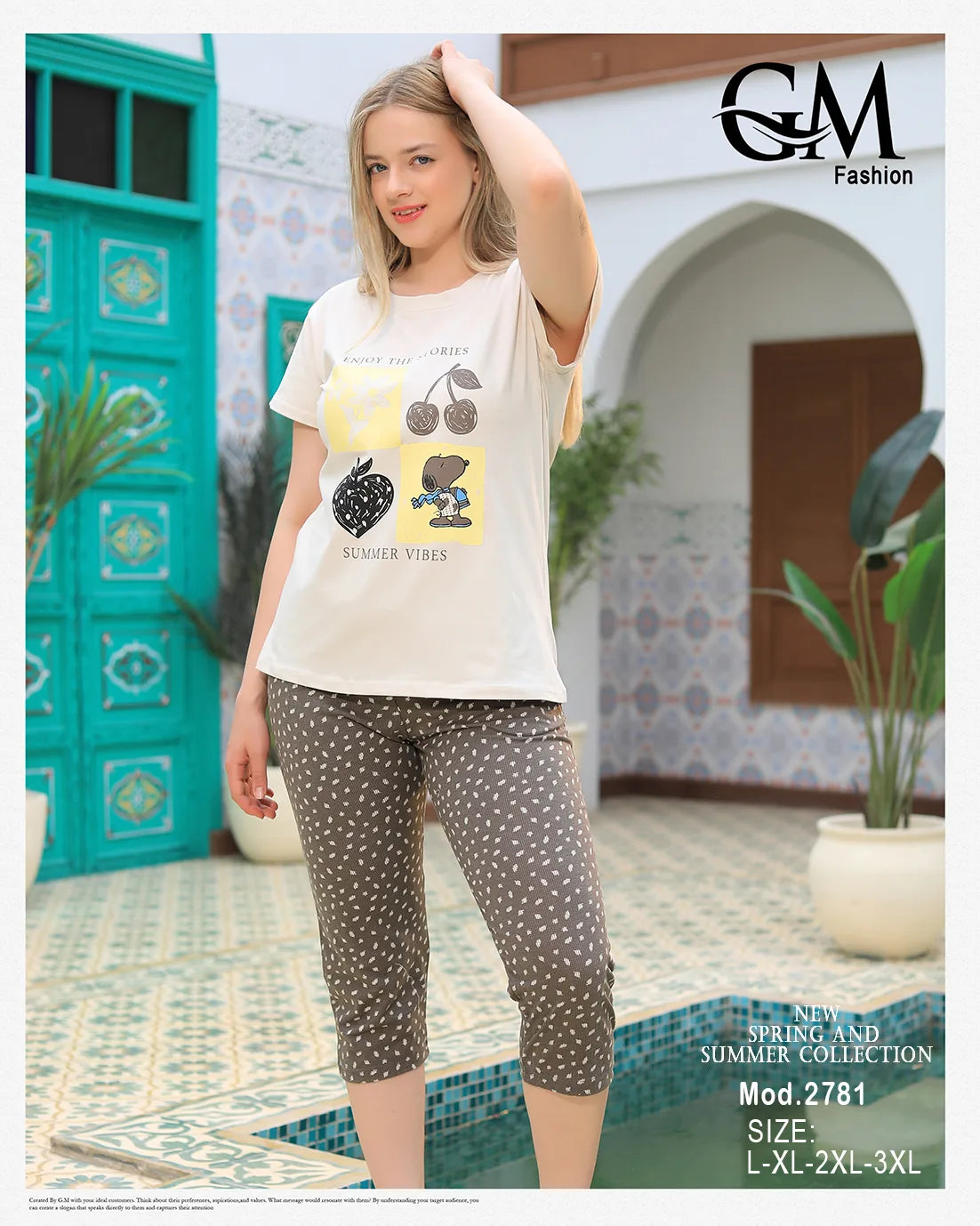 Woman wearing a white t-shirt with a graphic design and patterned leggings outdoors.