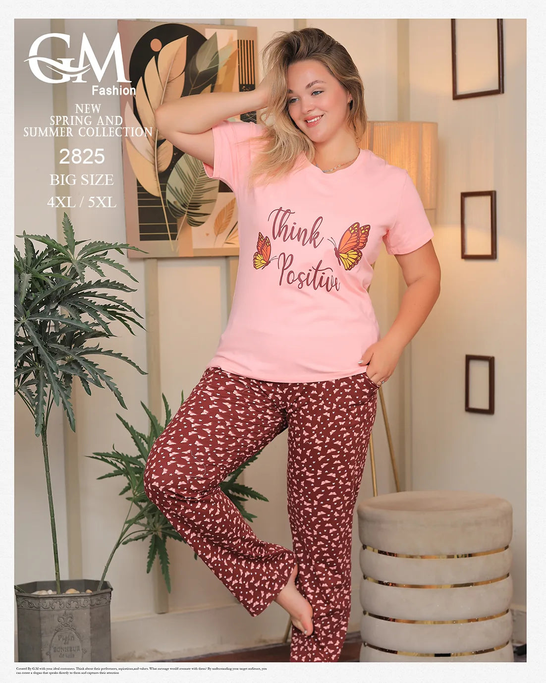 Woman wearing a pink 'Think Positive' shirt and red patterned pants in a room with decor elements.