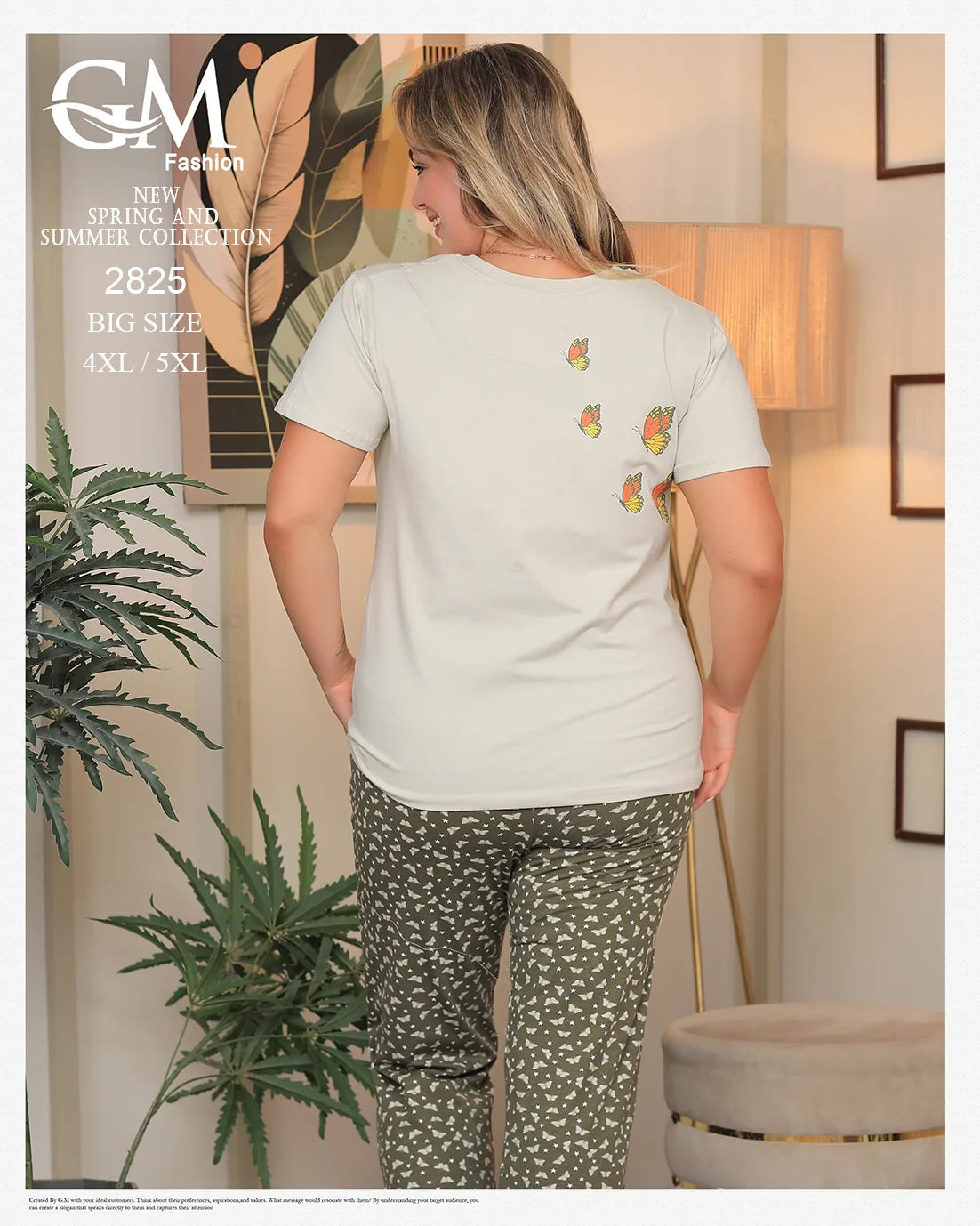 Woman wearing a light-colored t-shirt with fruit designs in a home setting.