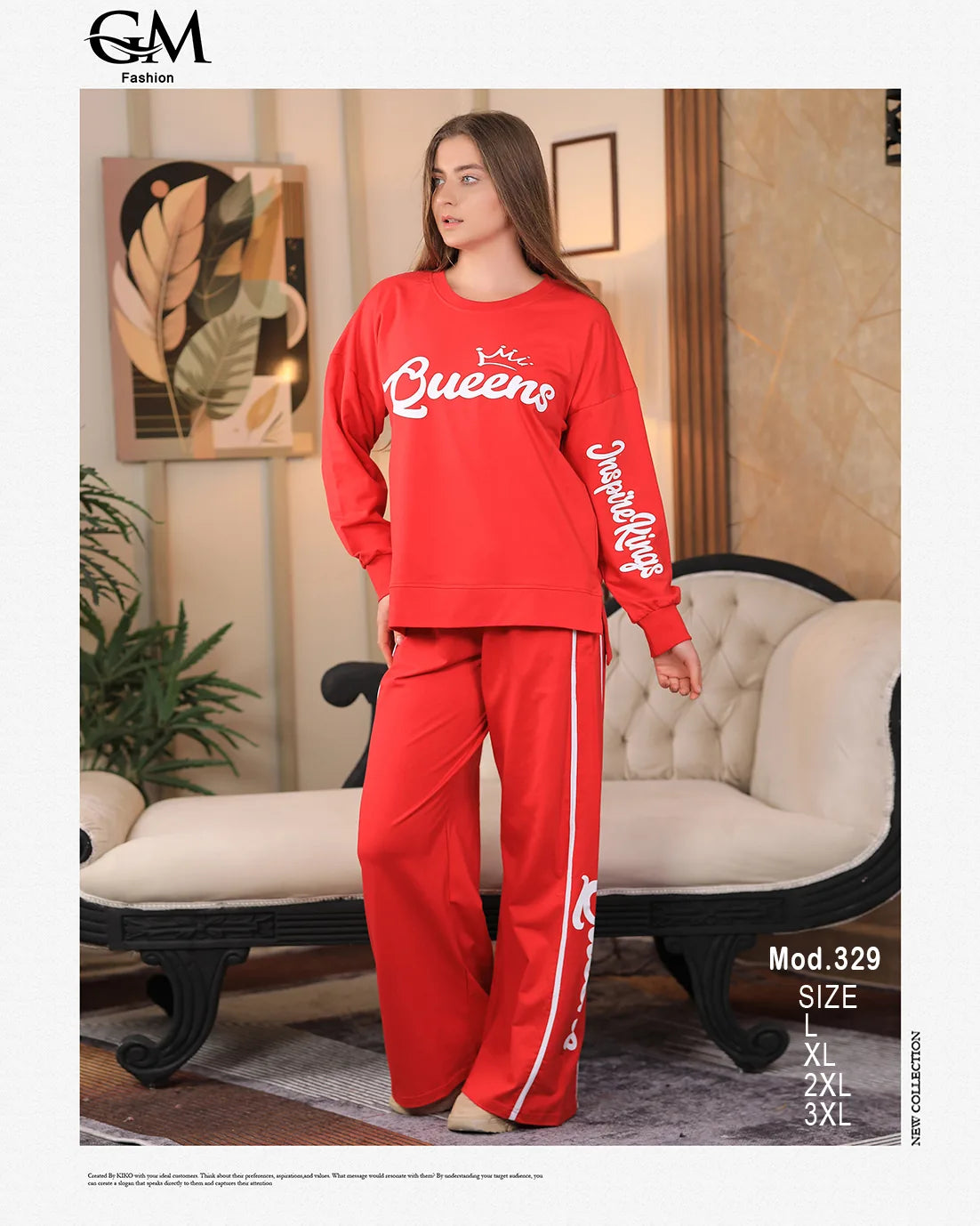 Woman wearing a red 'Queens' tracksuit in a living room setting with GM Fashion branding.