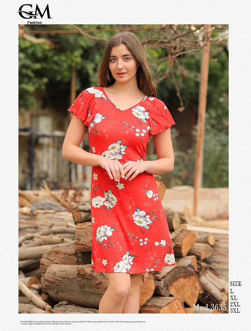 Woman wearing a red floral dress standing in front of wooden logs with 'G&G Fashion' branding.