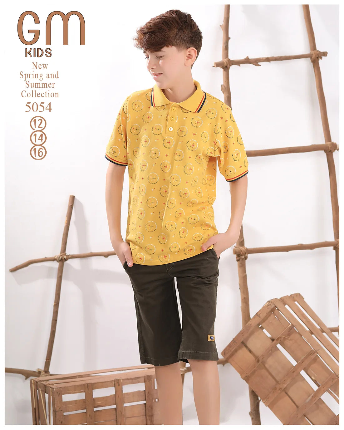 Child wearing a yellow shirt and green shorts standing next to wooden crates and a ladder.