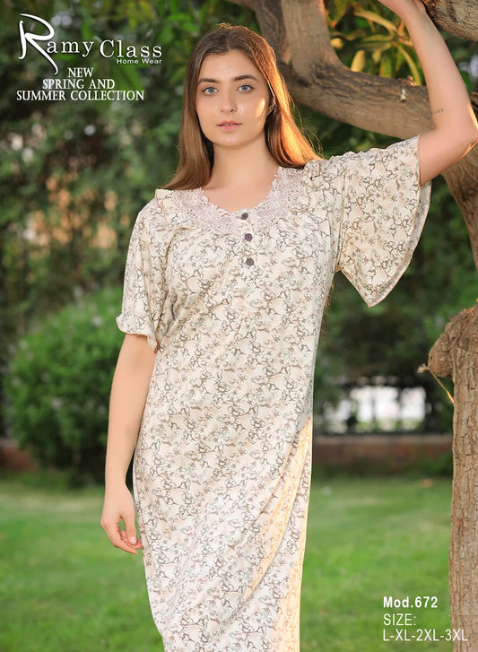 Woman wearing a floral dress with 'Ramy Class' branding in the background.