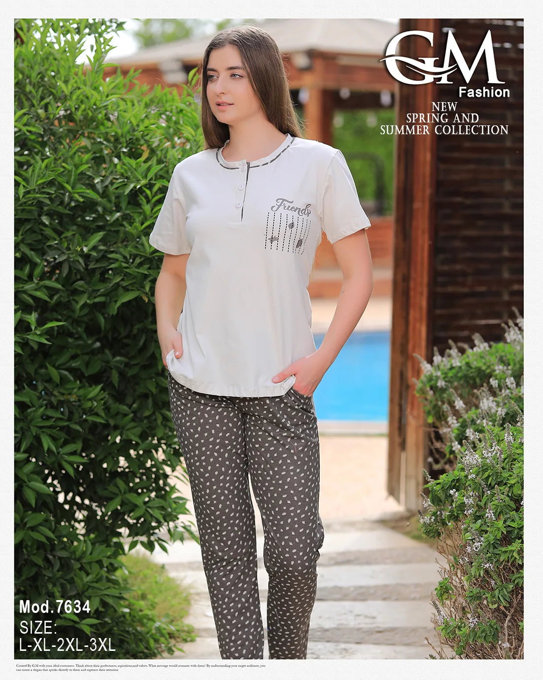 Woman wearing a white top and patterned pants with 'GM Fashion' branding.