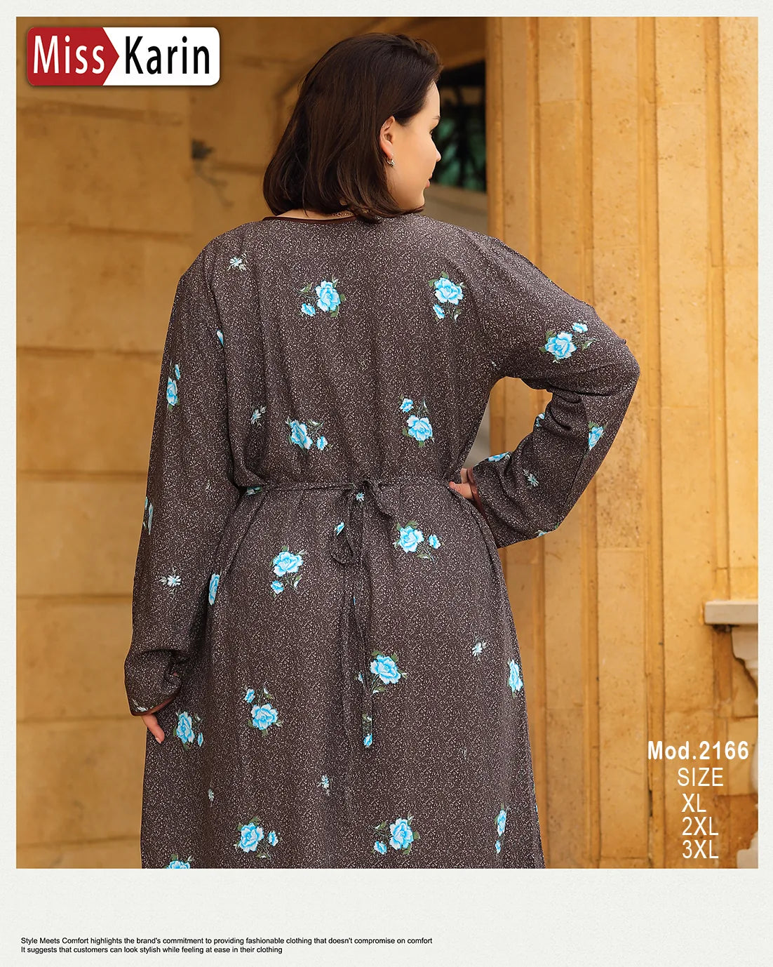 Woman wearing a floral dress with a wooden door in the background, featuring the brand 'Miss Karin'.