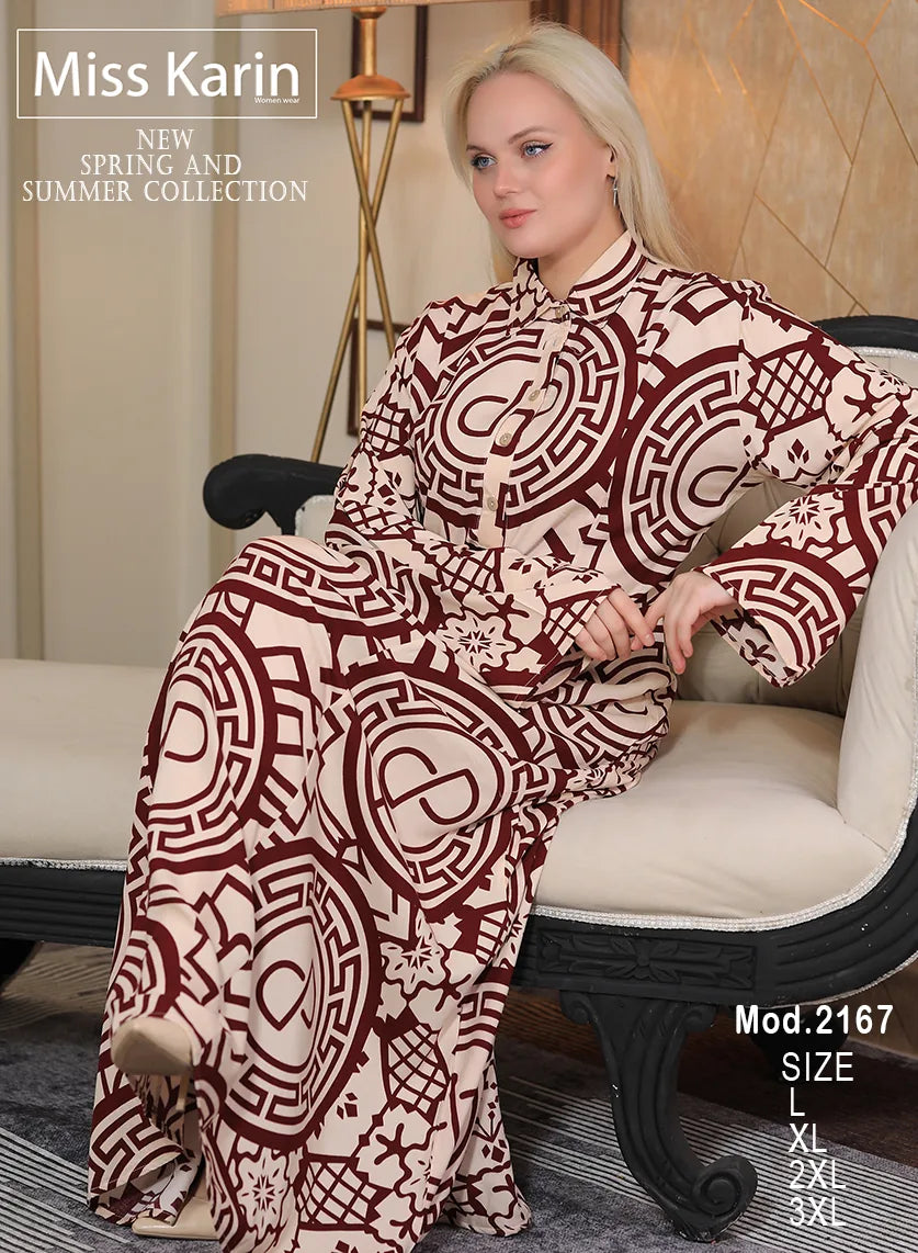 Woman wearing a patterned dress sitting on a chair with 'Miss Karin' branding.