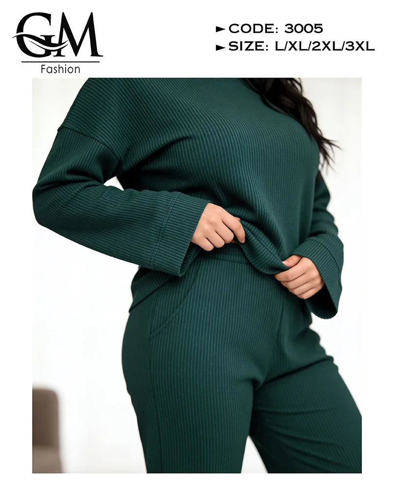 Green ribbed sweater and pants set with visible brand logo and product details.