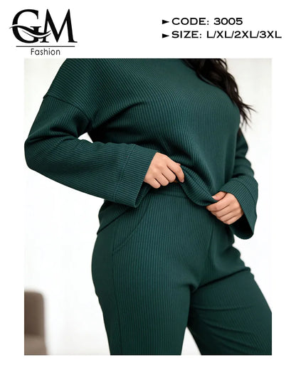 Green ribbed sweater and pants set with visible brand logo and product details.
