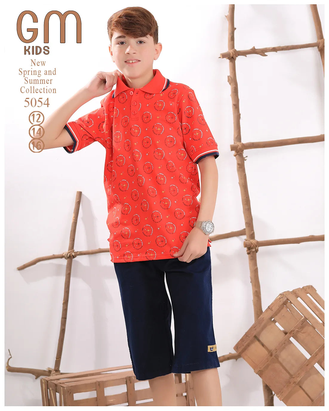 Child wearing a red patterned shirt and navy shorts with a wooden ladder background