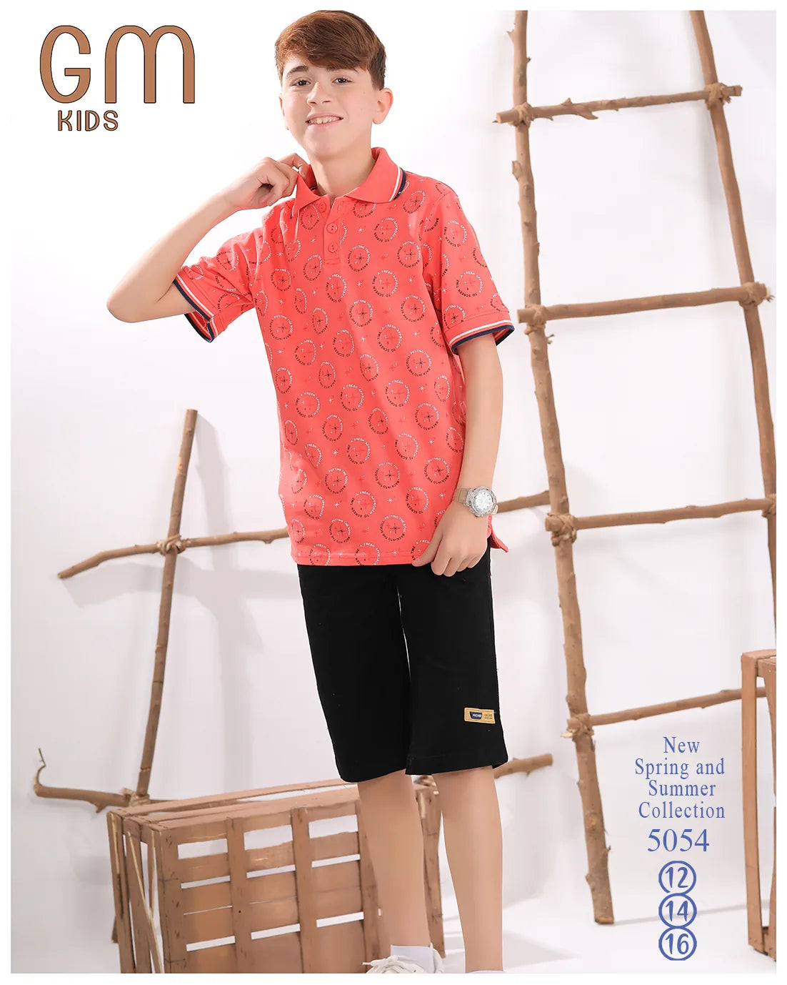 Child wearing a red patterned shirt and black shorts with 'GM Kids' branding.