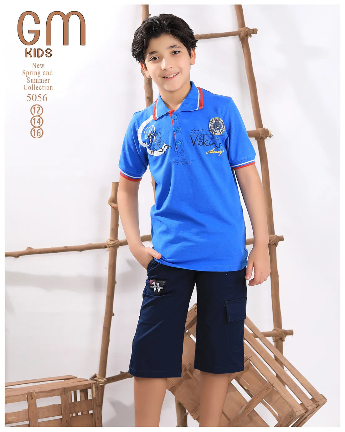 Child wearing a blue polo shirt and navy shorts with a visible brand logo, standing against a white background.