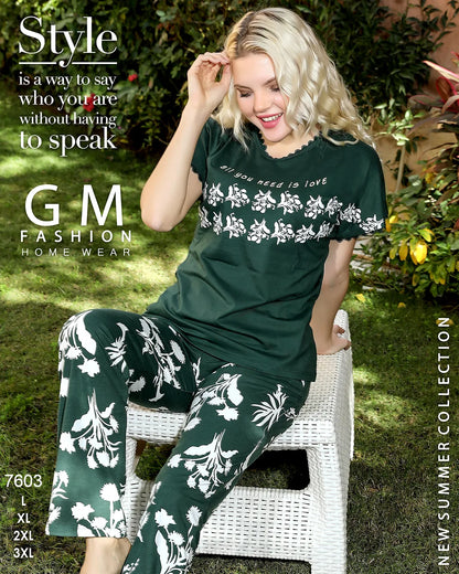 Woman wearing a green floral outfit with text about fashion and GM Fashion.