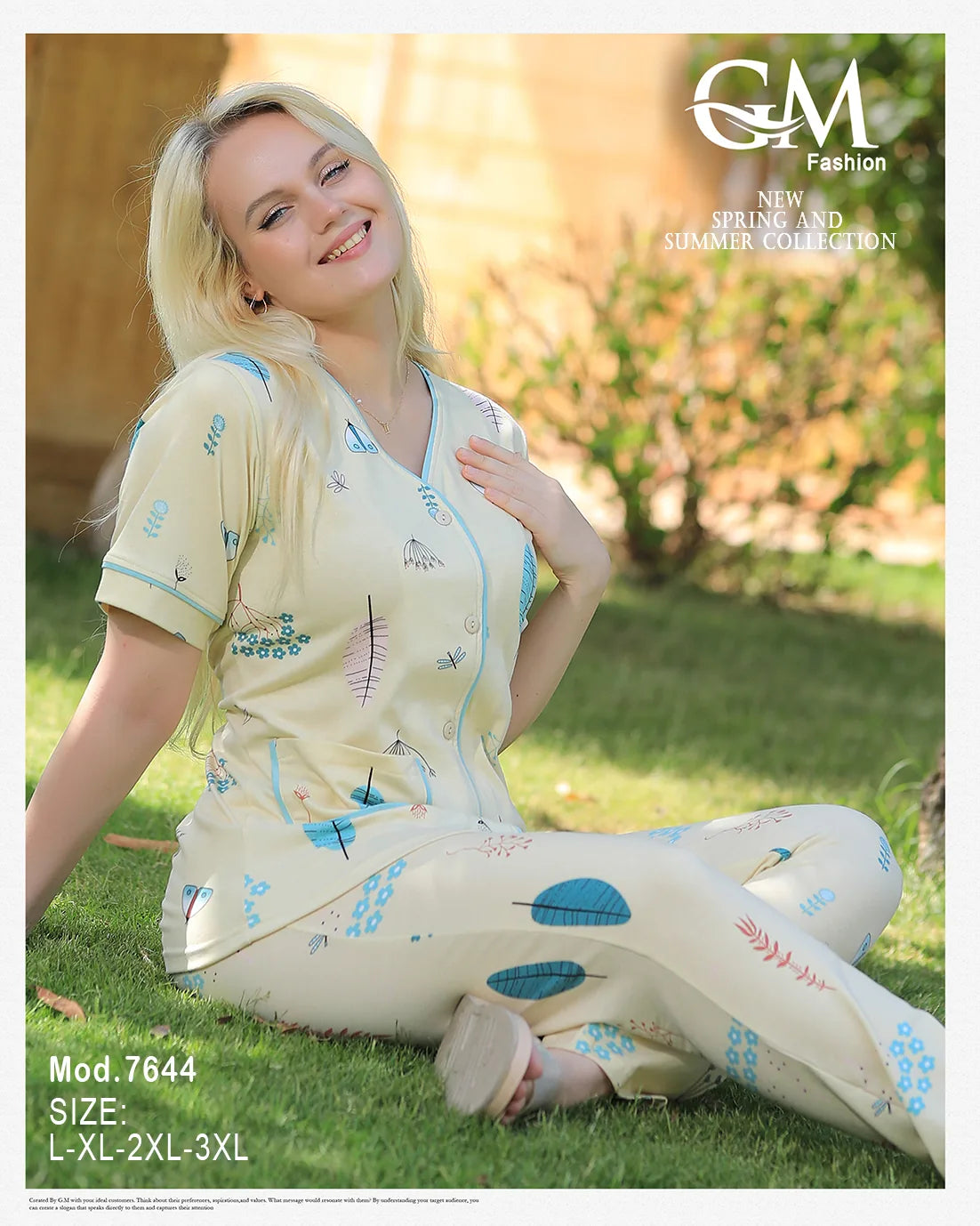 Woman in a floral dress sitting on grass with 'GM Fashion' branding.