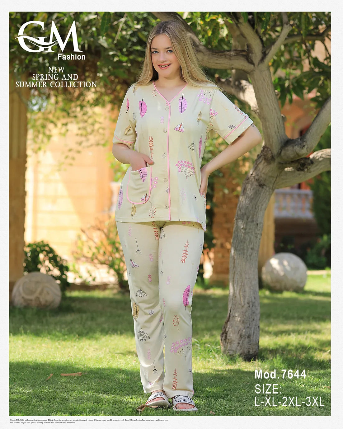 Woman wearing a matching outfit with pink hearts in a garden setting, featuring G&G Fashion branding.